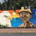 Painting Boy and Eagle Mural in Cancun