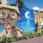 Painting Boy and Eagle Mural in Cancun