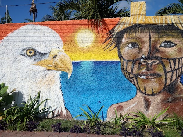 Painting Boy and Eagle Mural in Cancun